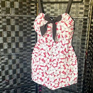 Size Large Unique Vintage Hello Kitty Print romper with front pockets